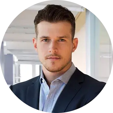 A smiling woman with short brown hair